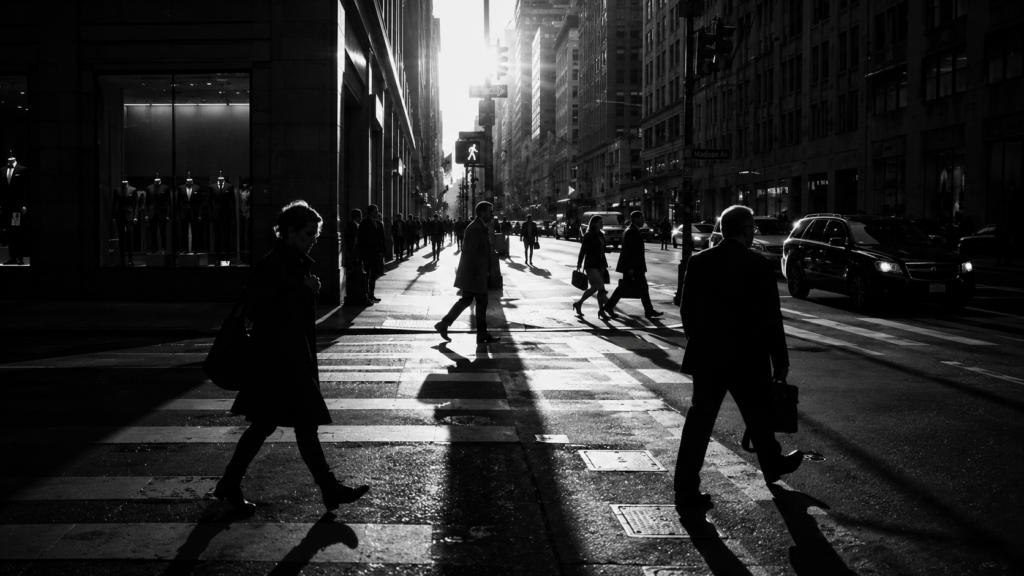 Street photography scene with dramatic monochrome lighting